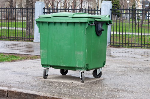 Commercial waste removal team at work in Osterley