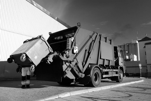 Commercial waste removal trucks in Osterley